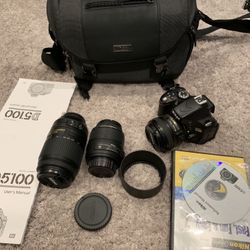 Nikon dslr 5100 original package and added prime lens