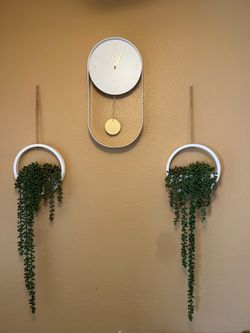 Clock and plant decor