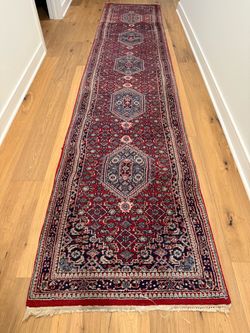 Vintage Persian hand knotted wool runner rug