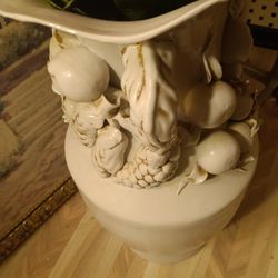 Ceramic Vase for Floor or Table 
26 inches tall by 20" wide.
Embellished with fruit and leaves.