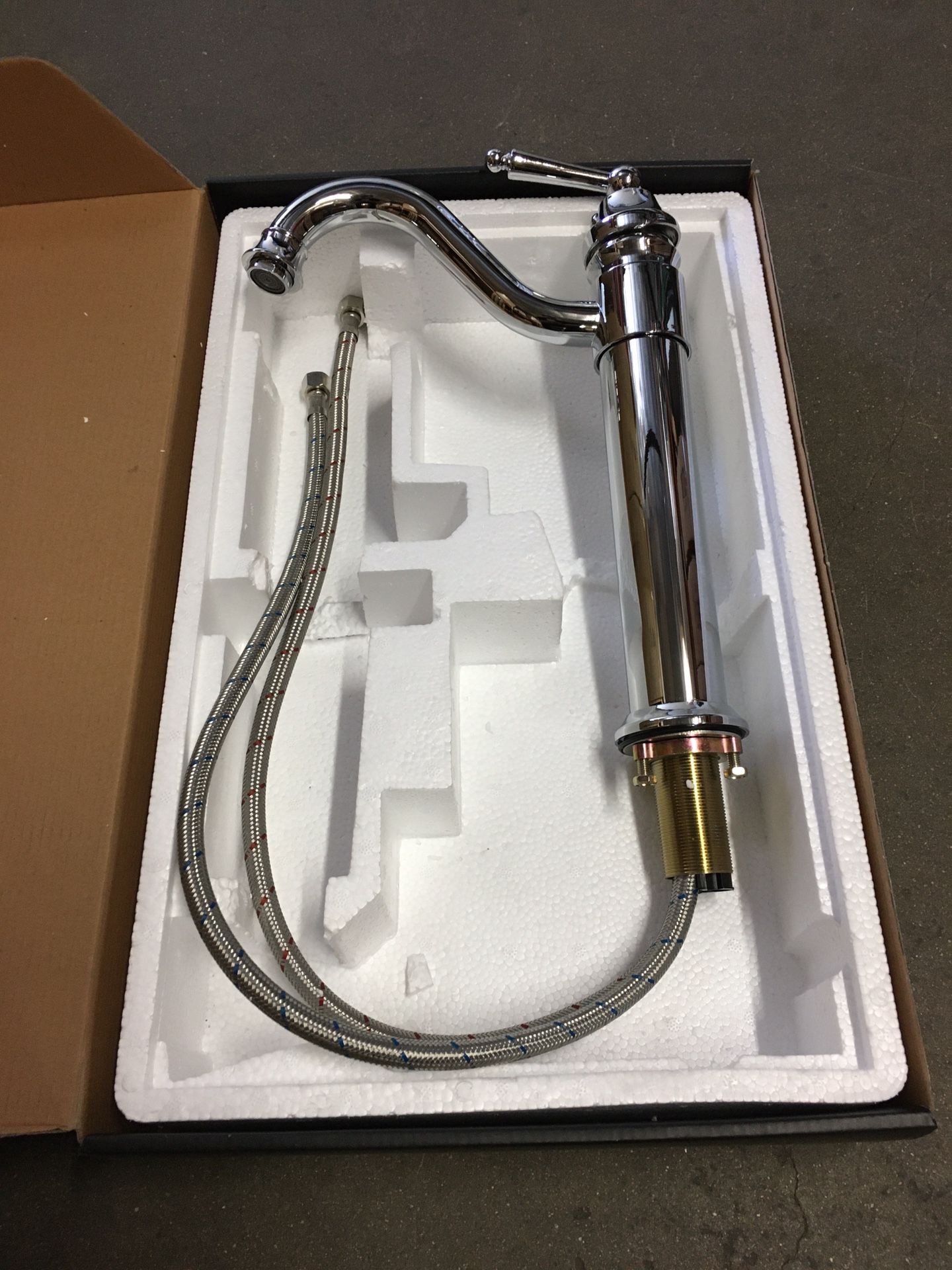 New in Box $25 chrome color single handle bathroom vessel faucet 