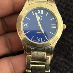 Gold tone c quartz watch