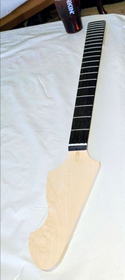 Unfinished maple bass guitar neck with rosewood fretboard