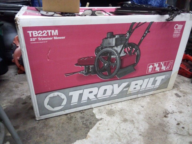 Troy Bilt Mower Trimmer And Attachments