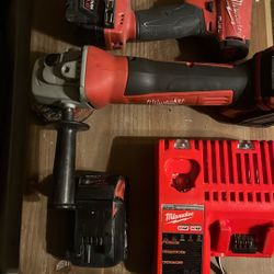 Milwaukee Fuel Surge Drill And Milwaukee Grinder