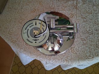 Polished chrome makeup mirror