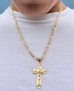 14K Gold Chain and 14k Gold Cross  23” inches long  21.1 Grams