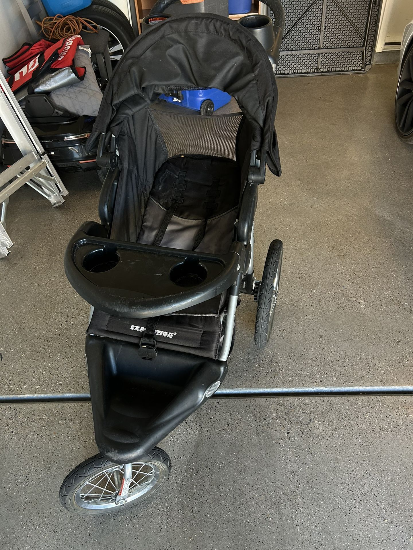 BABY TREND THREE WHEEL STROLLER