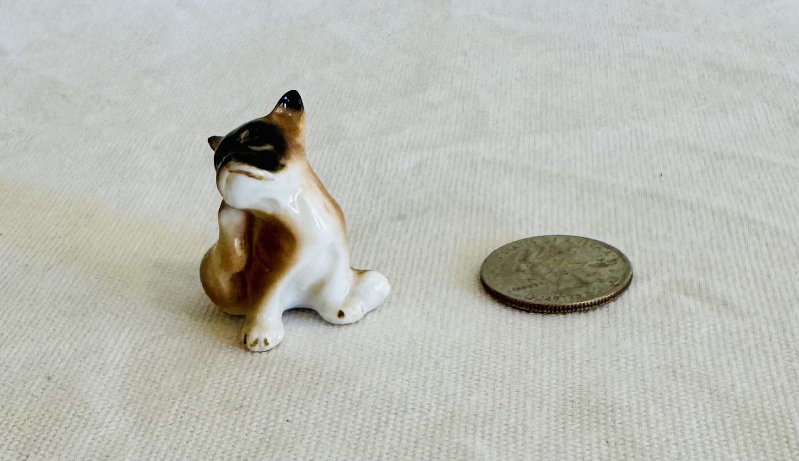 Miniature bone china dog figurine