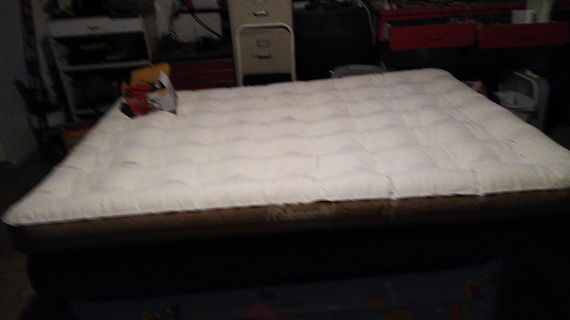 Brand new Coleman queen-size air mattress with pump
