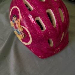 Pink child’s helmet