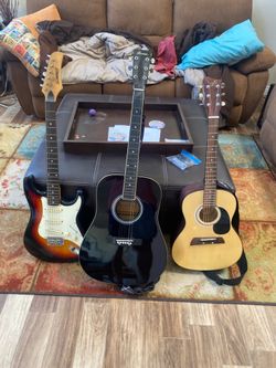Guitars Electric and Acoustic musical instruments