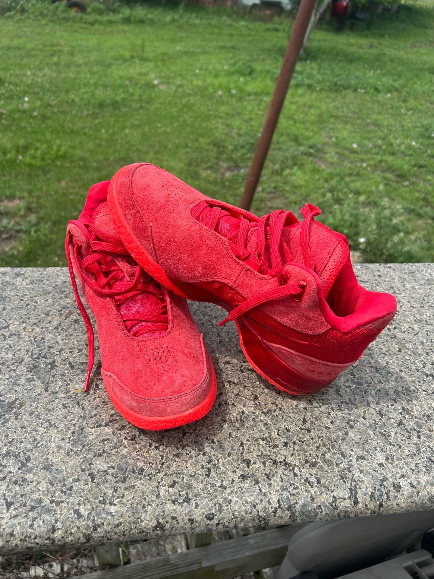 Nike Zoom LeBron NXXT Gen AMPD "James Gang" basketball shoes in a university red and bright crimson colorway.