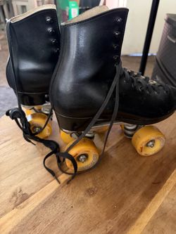 Women’s black leather skates size 8