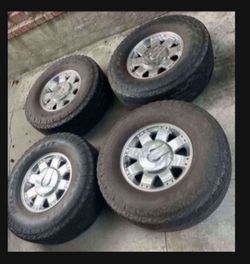 4 - 35x12.50r17LT 8x6.5 8x165.1 Stock Hummer H2 Chrome Rims Wheels Tires
