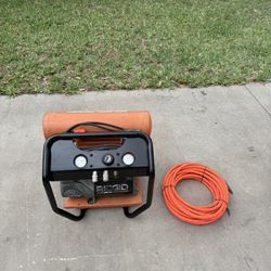 Ridgid 4.5gl 150psi air compressor + hose