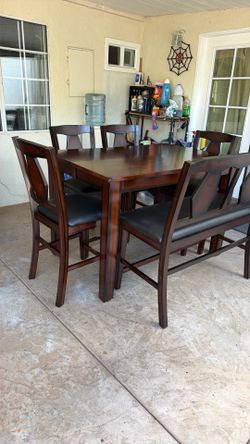 Dining table and 4 Chairs One bench like New