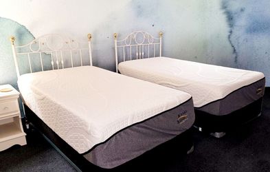 Twin bed with iron white metal  head board