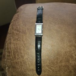 Watch Pearl Face With Black Leather Band. Battery Cost $25