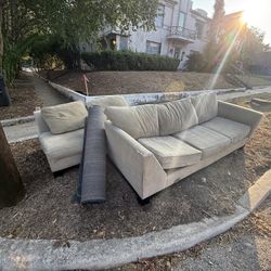 Free Beige Sectional & Blue Area Rug