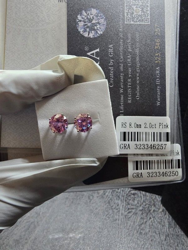 These 925 silver earrings feature 2 pink Moissanite diamond