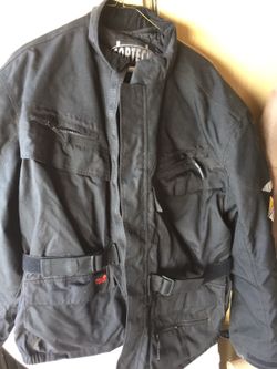 CORTECH motorcycle jacket by TOURMASTER with built in shell in back and sleeves