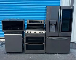 Complete LG stainless steel black kitchen set combo package  (refrigerator, stove, microwave, dishwasher)