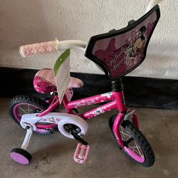 12 INCH MINIE MOUSE DISNEY BIKE NEEDS A FRONT INNERTUBE