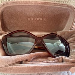Miu Miu. Sunglasses