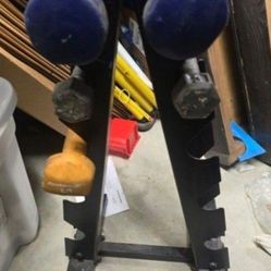 Dumbbell Rack With Some Dumbbells