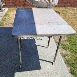 A Vintage Antique Type Writer Table On Wheels 🛞 Needs A Cleaning Both  Sides Fold Down On Table 