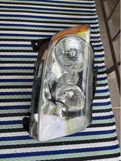 Headlight for 2011 Jeep Grand Cherokee
