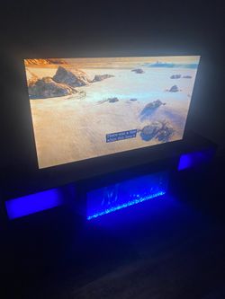 55" Roku TV + LED Electric Fireplace Media Stand (Like New!)