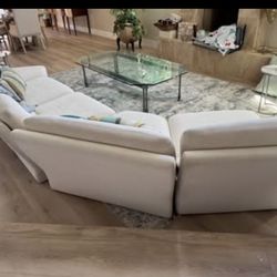 5 pieces can put together any way you like. In fairly decent condition.  Ouch sectional   You can move them around and put 2 together on one side if r