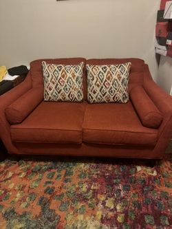 Orange Love seat