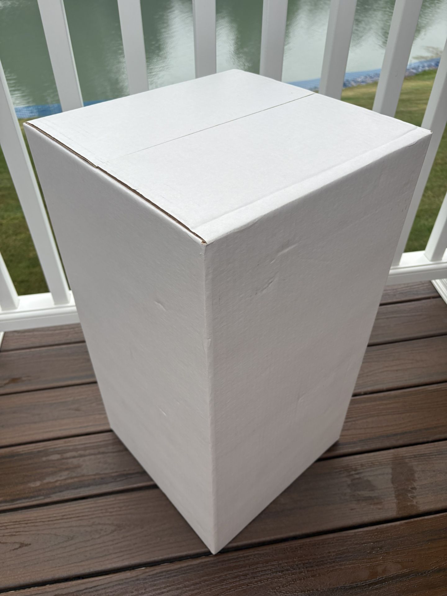 FREE, - Bleach White Corr. Kraft Riser Stand