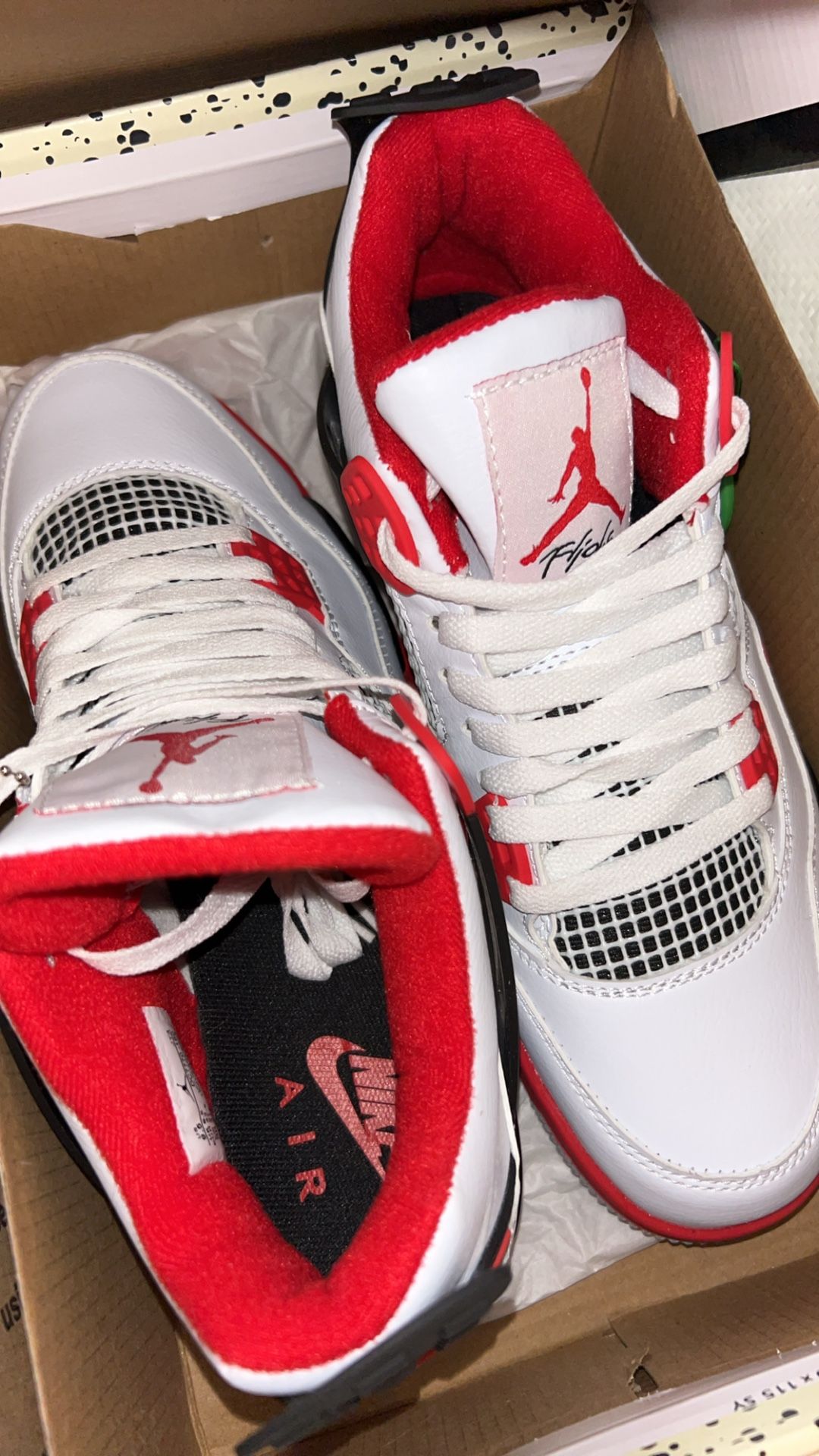 Jordan 4 “Fire Red”