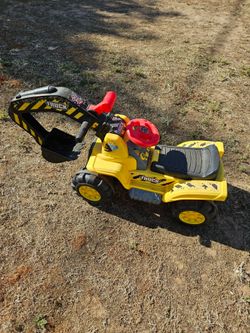 Kid ride tractor has sounds and the tractor handle goes up