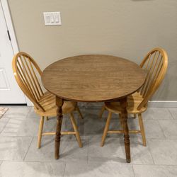 Breakfast Table And Two Chairs.  Sold Together Only 