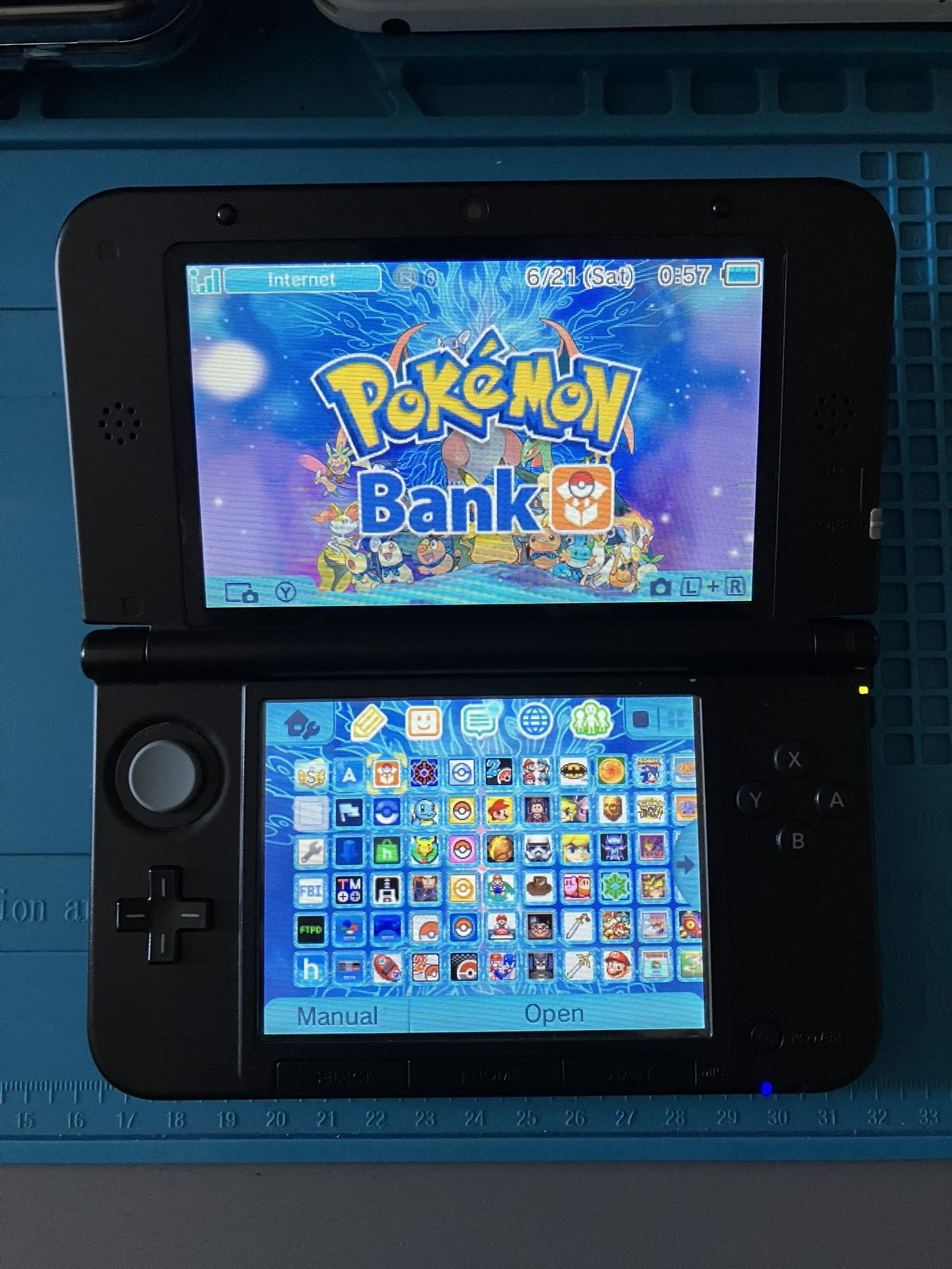 Nintendo Blue 3DS XL With Pokemon Bank, Pokemon DS, Stylus, 64 GB SD Card