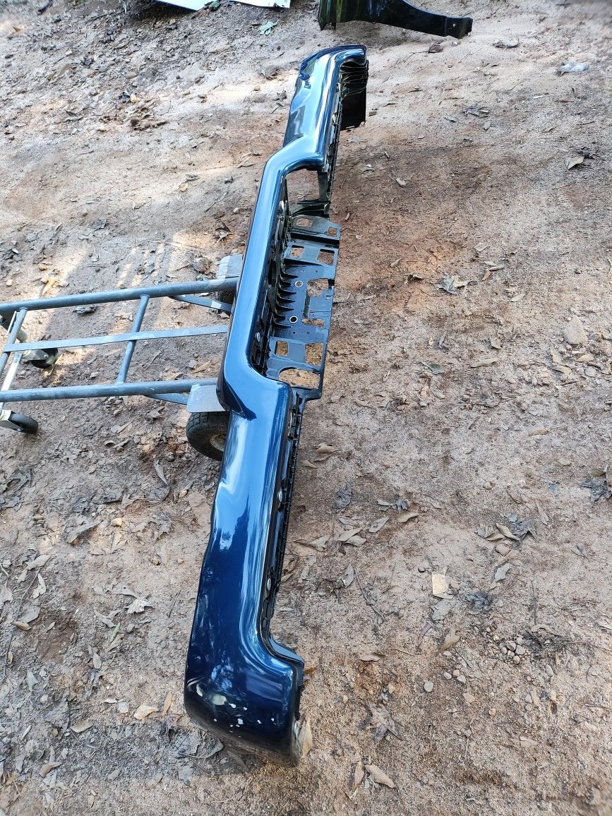 Dark Blue Rear Bumper For A 2019 To 24 Dodge Ram 1500 OEM Part