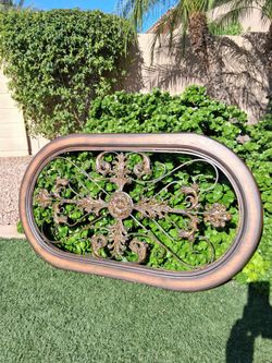 Oval Scrollwork Art