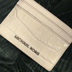 MICHAEL KORS SNAKE PRINT CARD HOLDER 25$