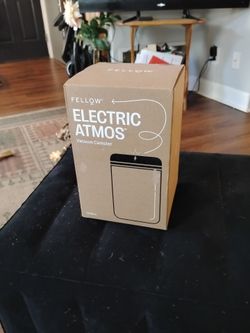 Electric amos vacuum canister