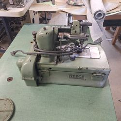 Raece bottom hole sewing machine