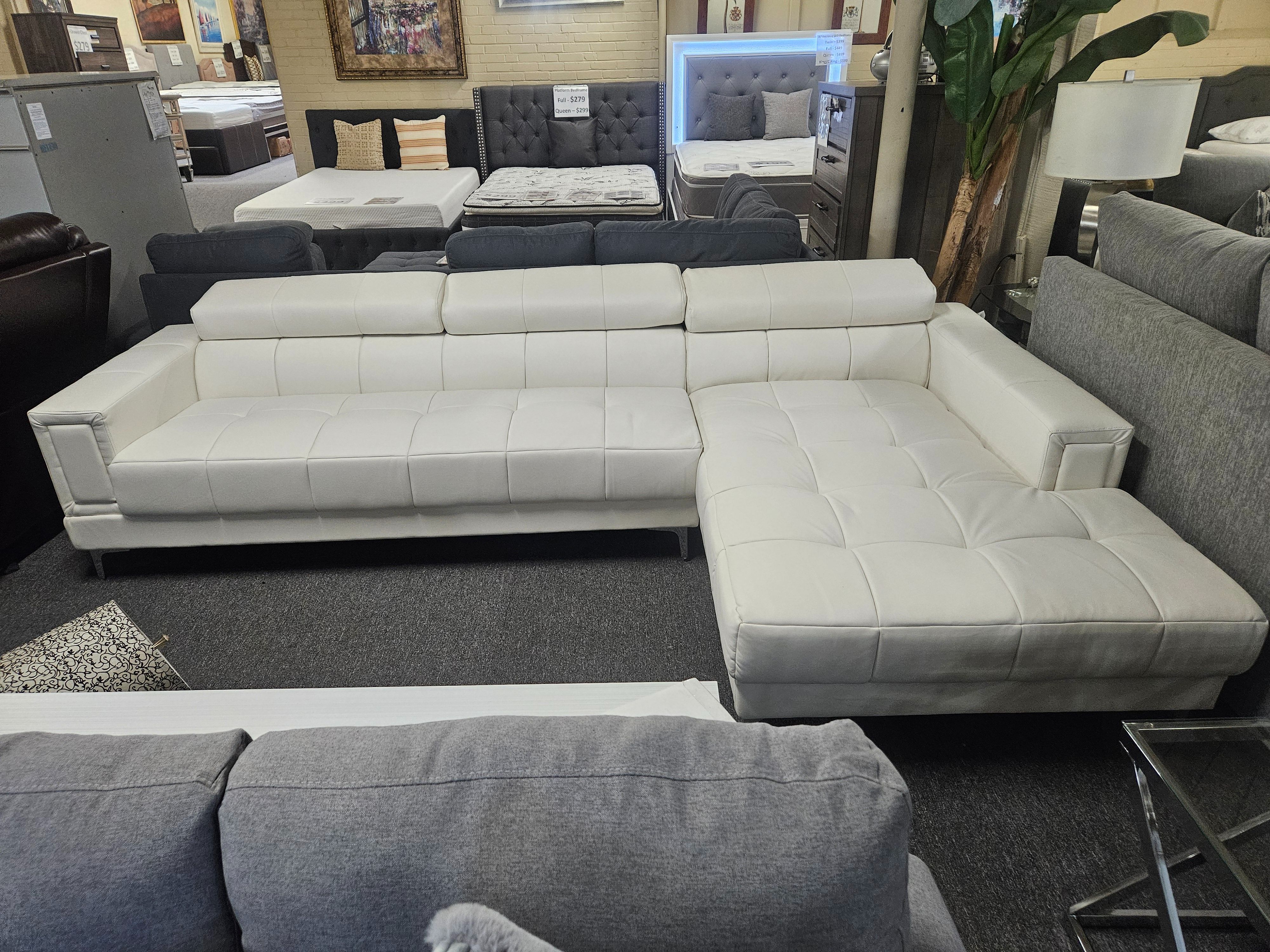 Brand new 102" x 75 " white faux leather sectional