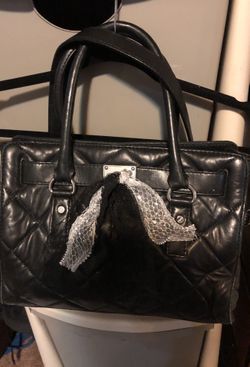 Michael Kor’s Quilted black leather purse like new!