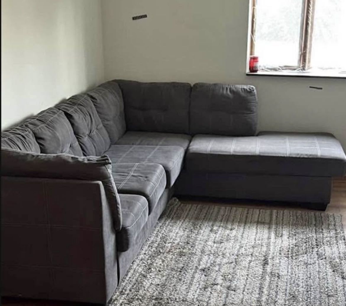 L Shape Couch With A Pull Out Mattress