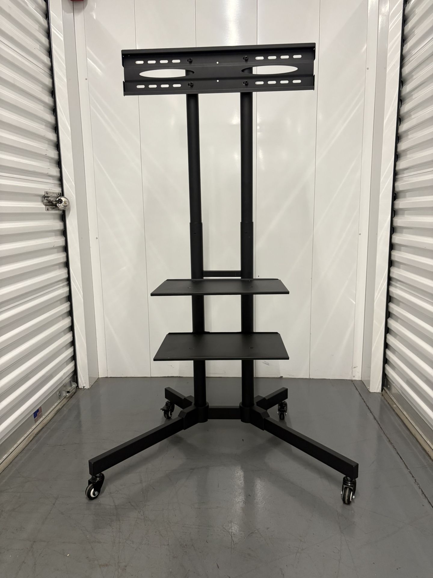 Rolling TV stand (like New)