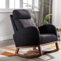 Lightly Used Black Upholstered Rocking Chair With Head Pillow